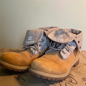 Gently used leather timberland boots w canvas high tops. Womens size 11